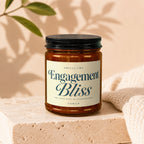 Amber jar candle "Engagement Bliss" with text "VOWED The Good Kind of Overwhelmed."