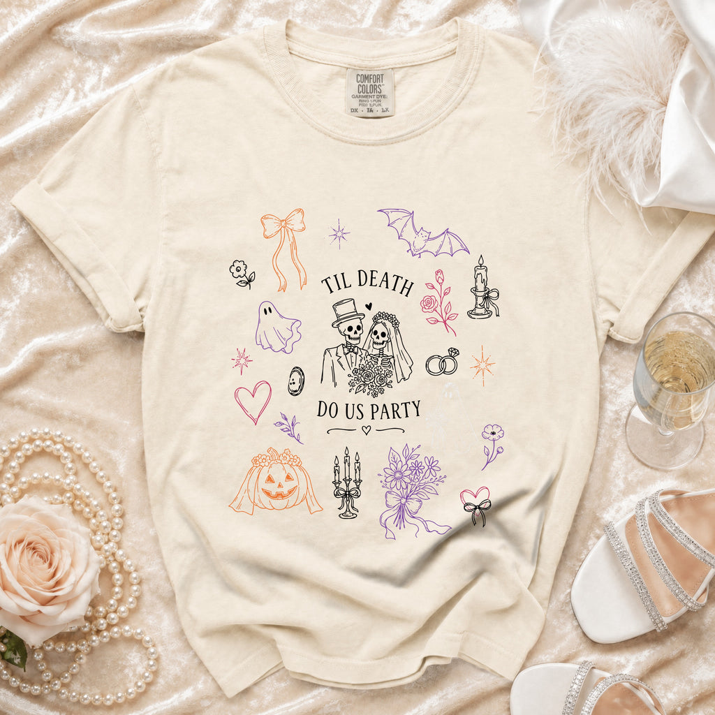 Cream t-shirt with "Til Death Do Us Party" text and Halloween wedding themed graphics.