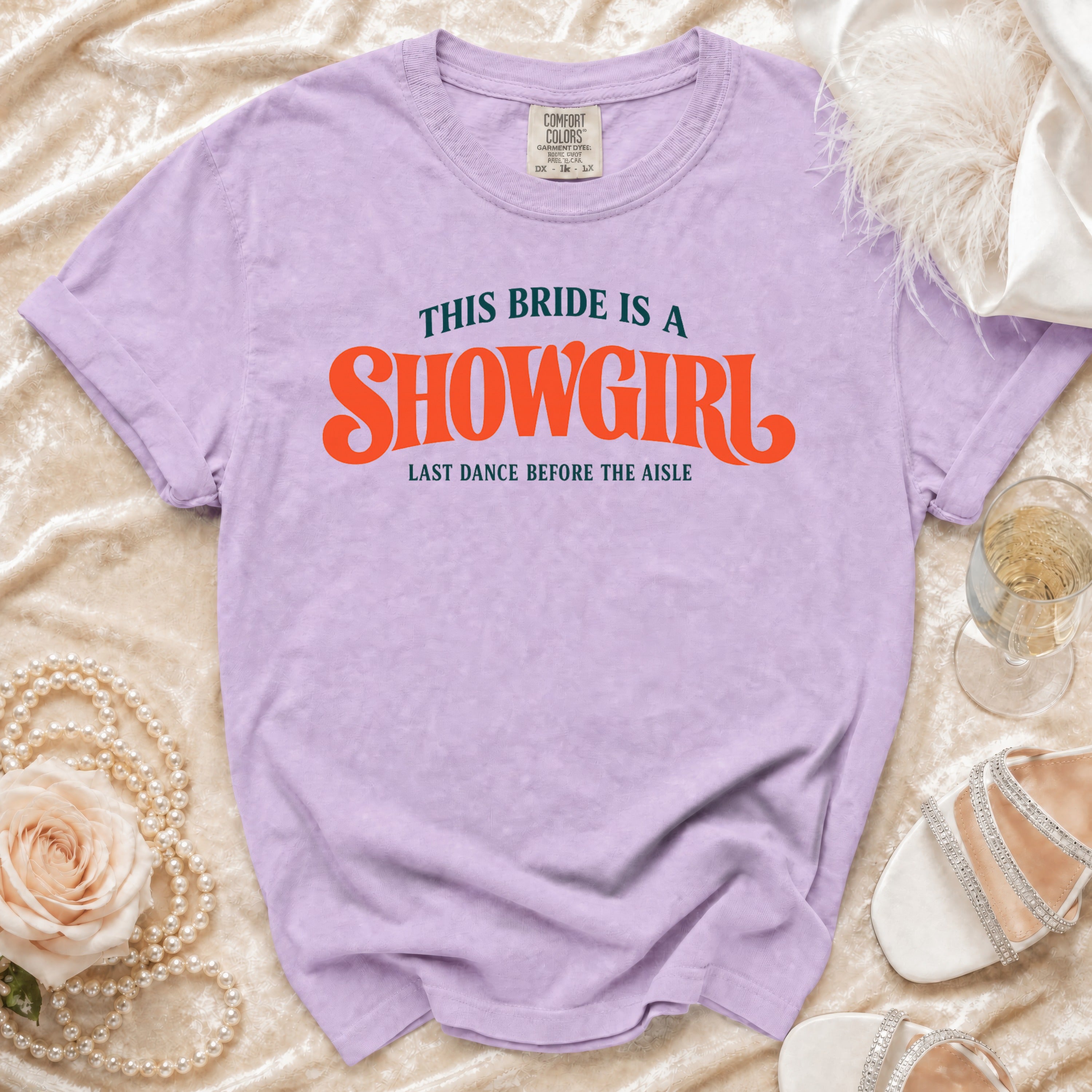 Lavender t-shirt with "This Bride is a Showgirl" and "Last Dance Before the Aisle" text.