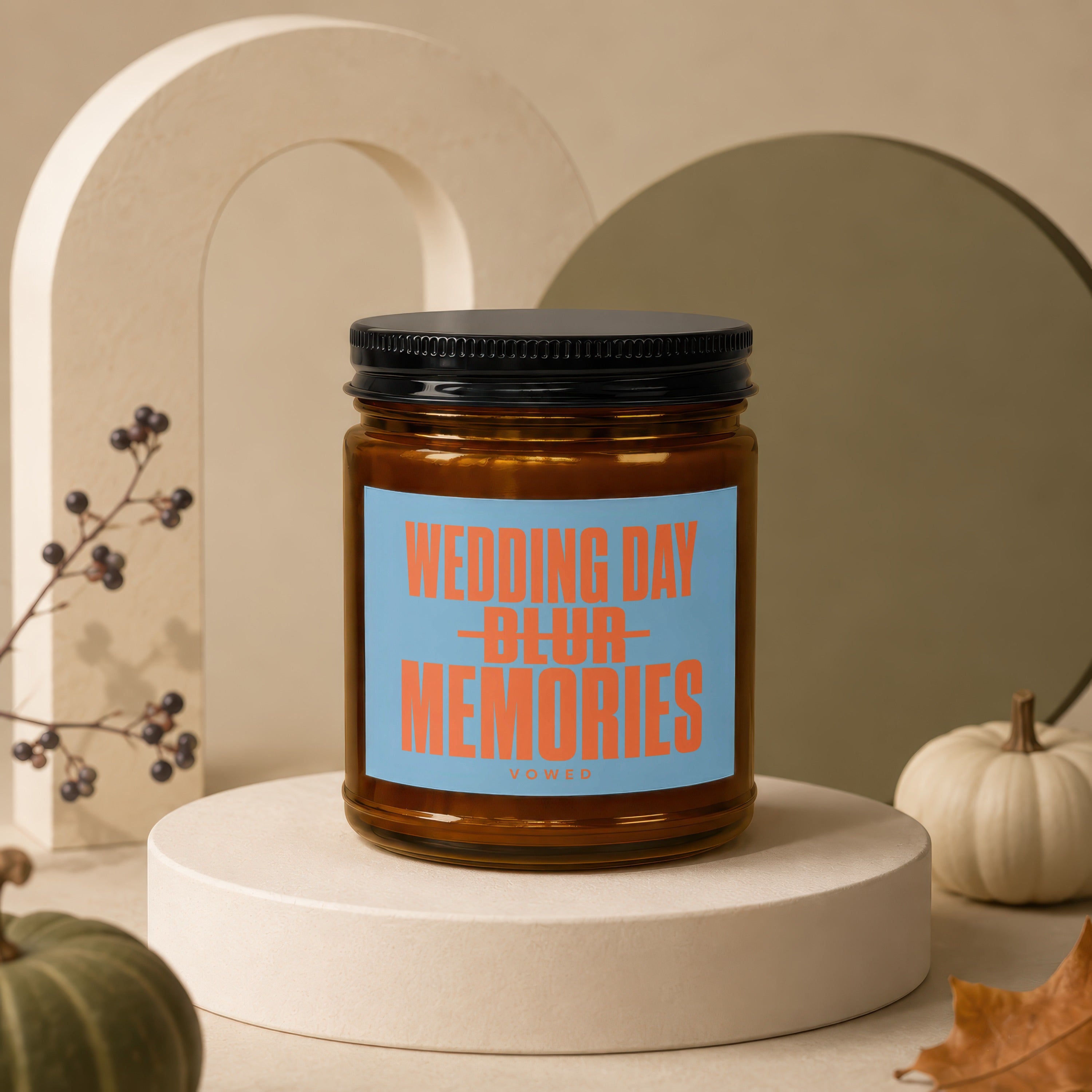 Amber candle with a blue label that reads "WEDDING DAY BLUR MEMORIES VOWED".