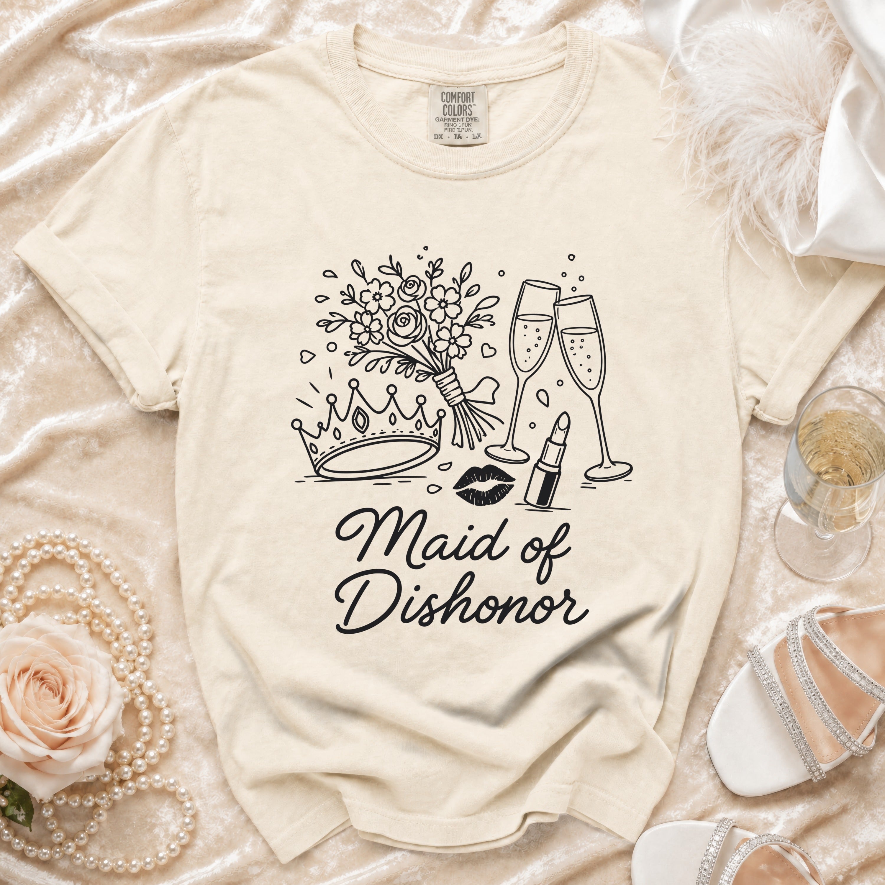 Cream t-shirt with "Maid of Dishonor" text and wedding graphics.