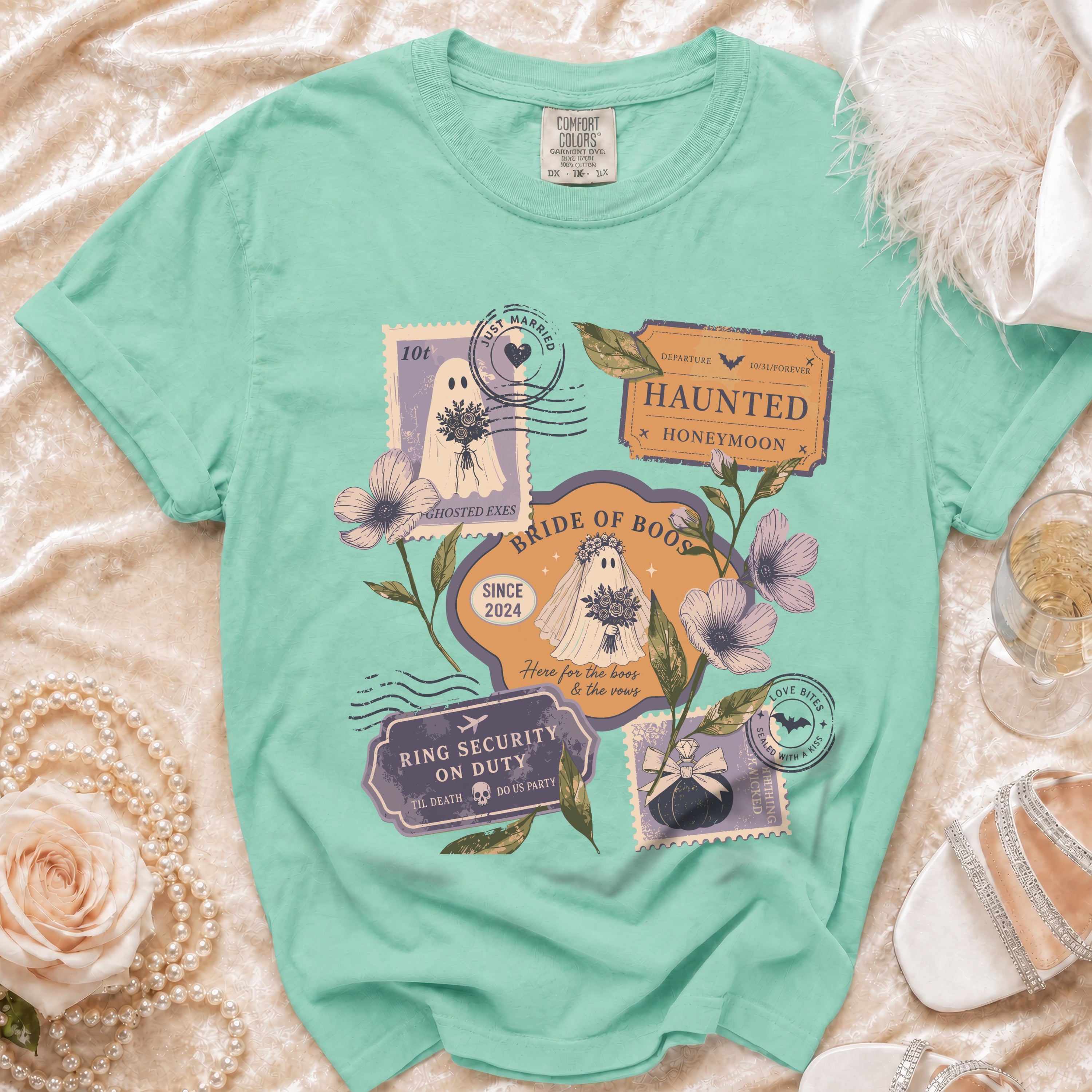 Mint green t-shirt with bride of boos and haunted honeymoon ghost graphic.