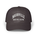 Dark grey baseball cap with white embroidered text reading Nashville Social Club centered on the front.