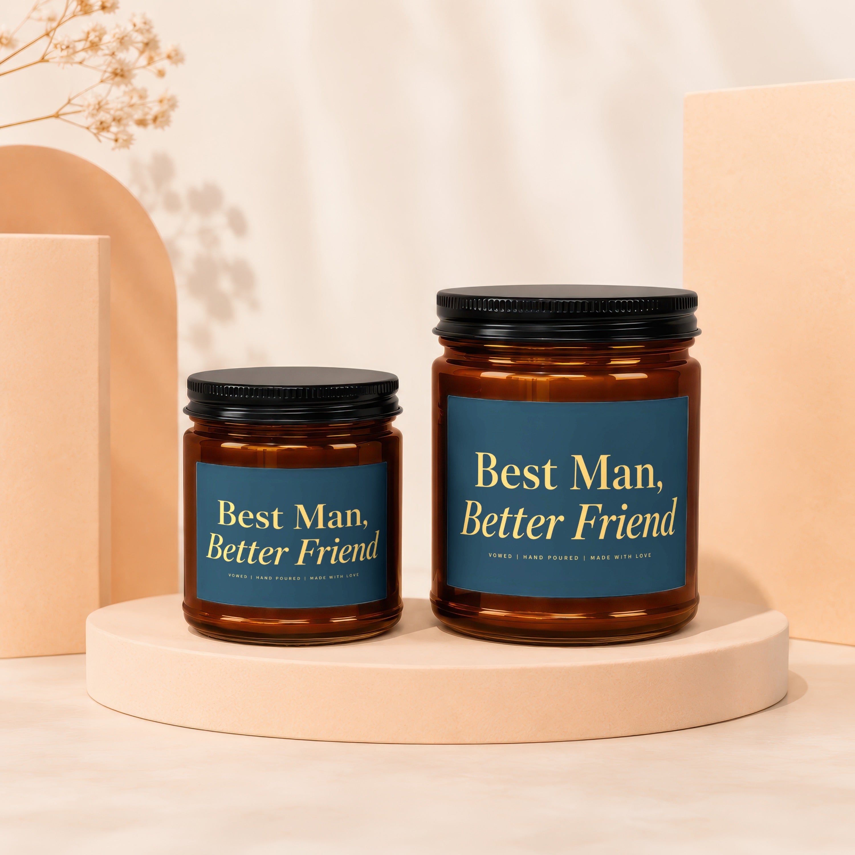 Two amber glass candles with blue labels reading "Best Man, Better Friend".