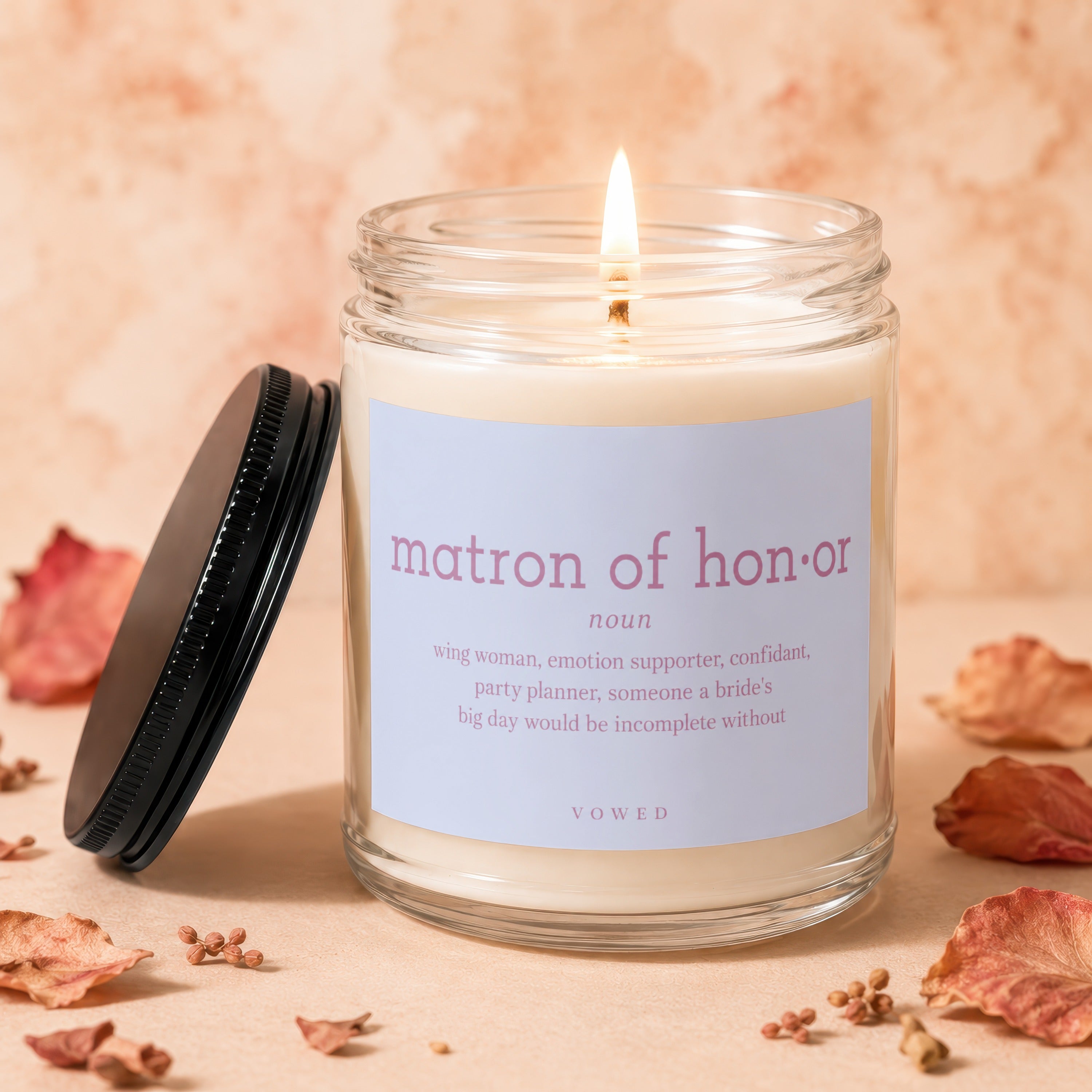 Matron of Honor candle with definition "VOWED" on label.