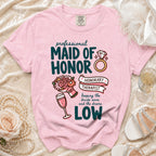 Pink t-shirt with "Maid of Honor Honorary Therapist" design and wedding graphics.