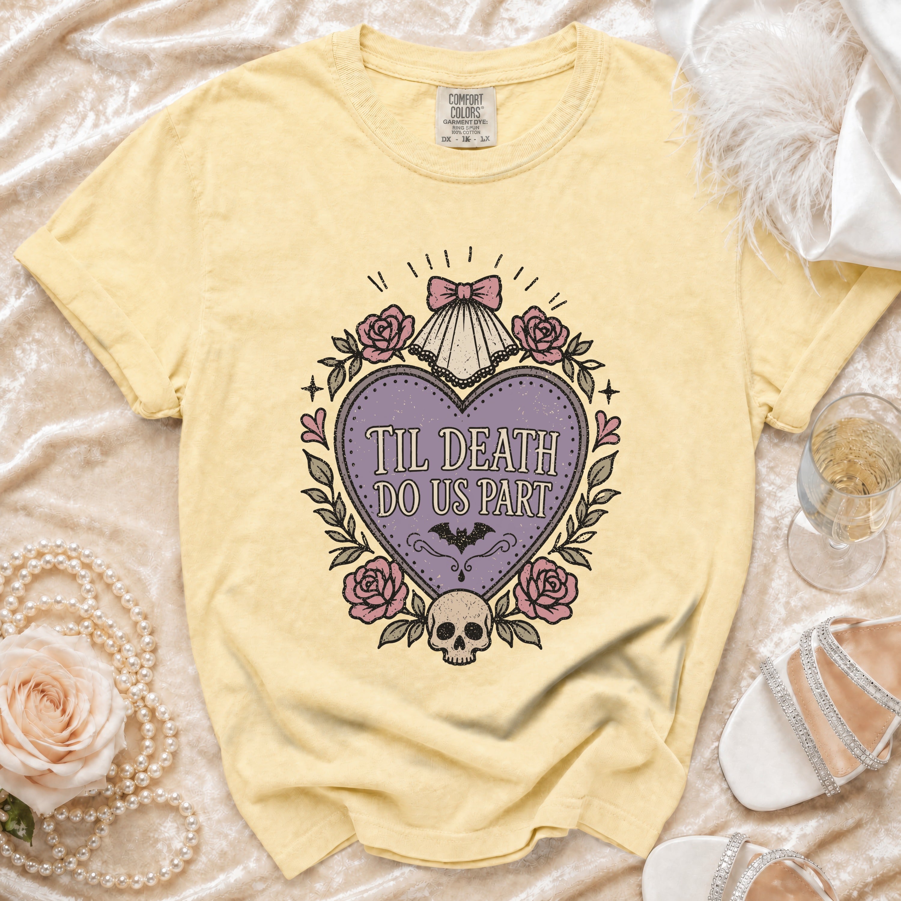 Yellow t-shirt with "Til Death Do Us Part" gothic heart graphic.