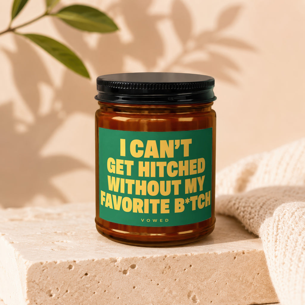 Candle with green label reading "I CAN'T GET HITCHED WITHOUT MY FAVORITE B*TCH".