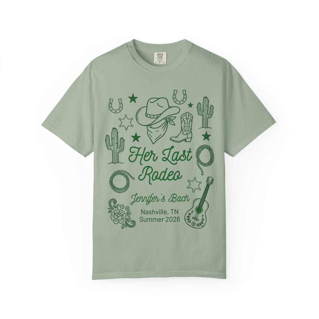 Green t-shirt with "Her Last Rodeo" text and Western graphics.