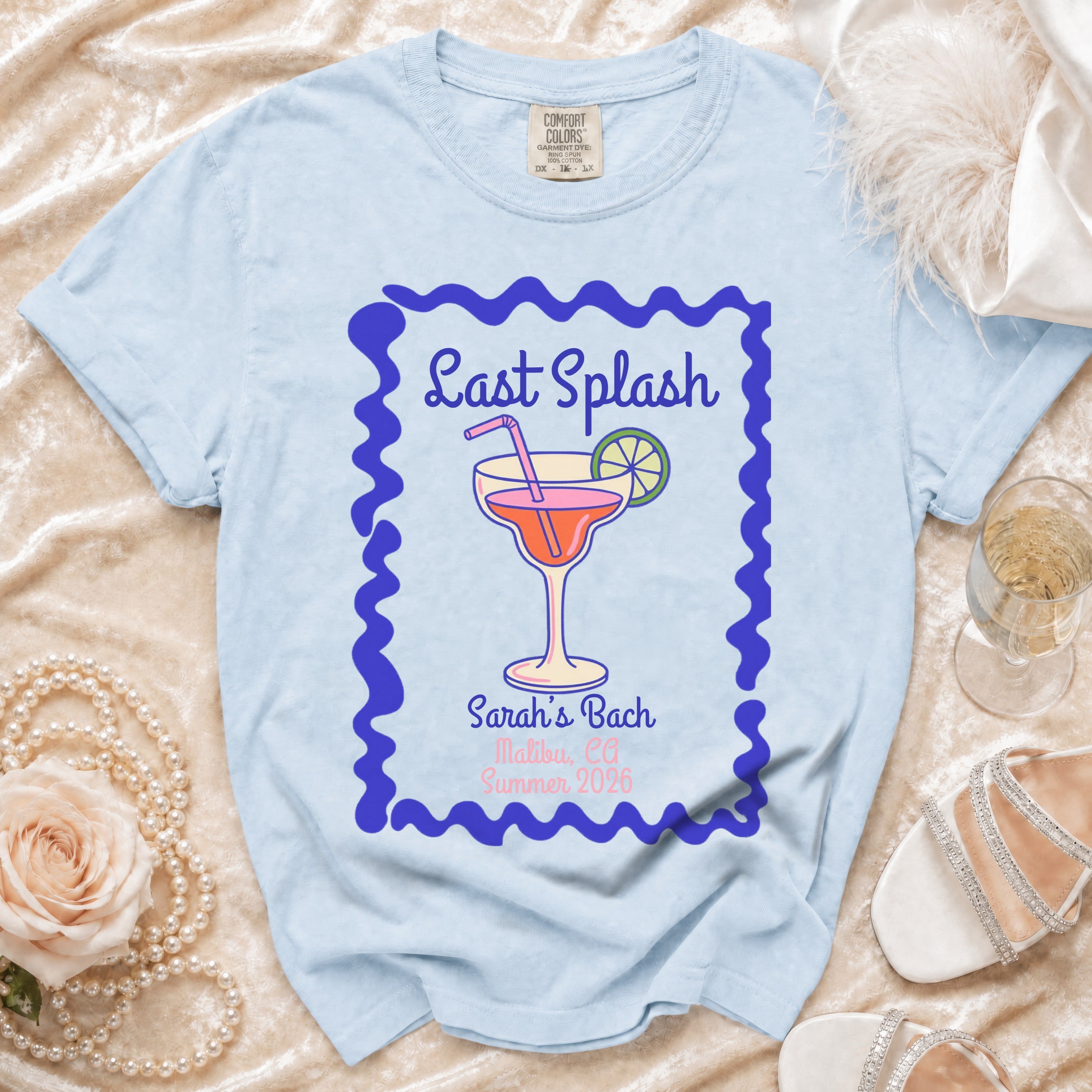 Light blue t-shirt with "Last Splash" and "Sarah's Bach Malibu, CA Summer 2026".