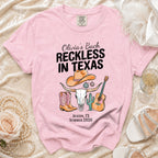 Pink t-shirt graphic with "Olivia's Bach Reckless in Texas" and Austin, TX Summer 2026.