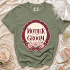 Green t-shirt with "Mother of the Groom" floral design in circular frame.