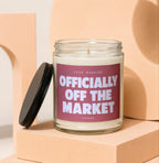 Candle with text "JUST MARRIED OFFICIALLY OFF THE MARKET VOWED".