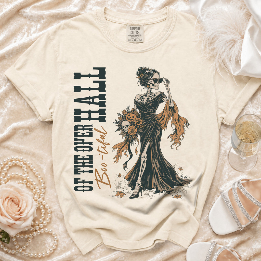 Skeleton woman in dress with flowers, text "OF THE OPER HALL Boo-tiful".