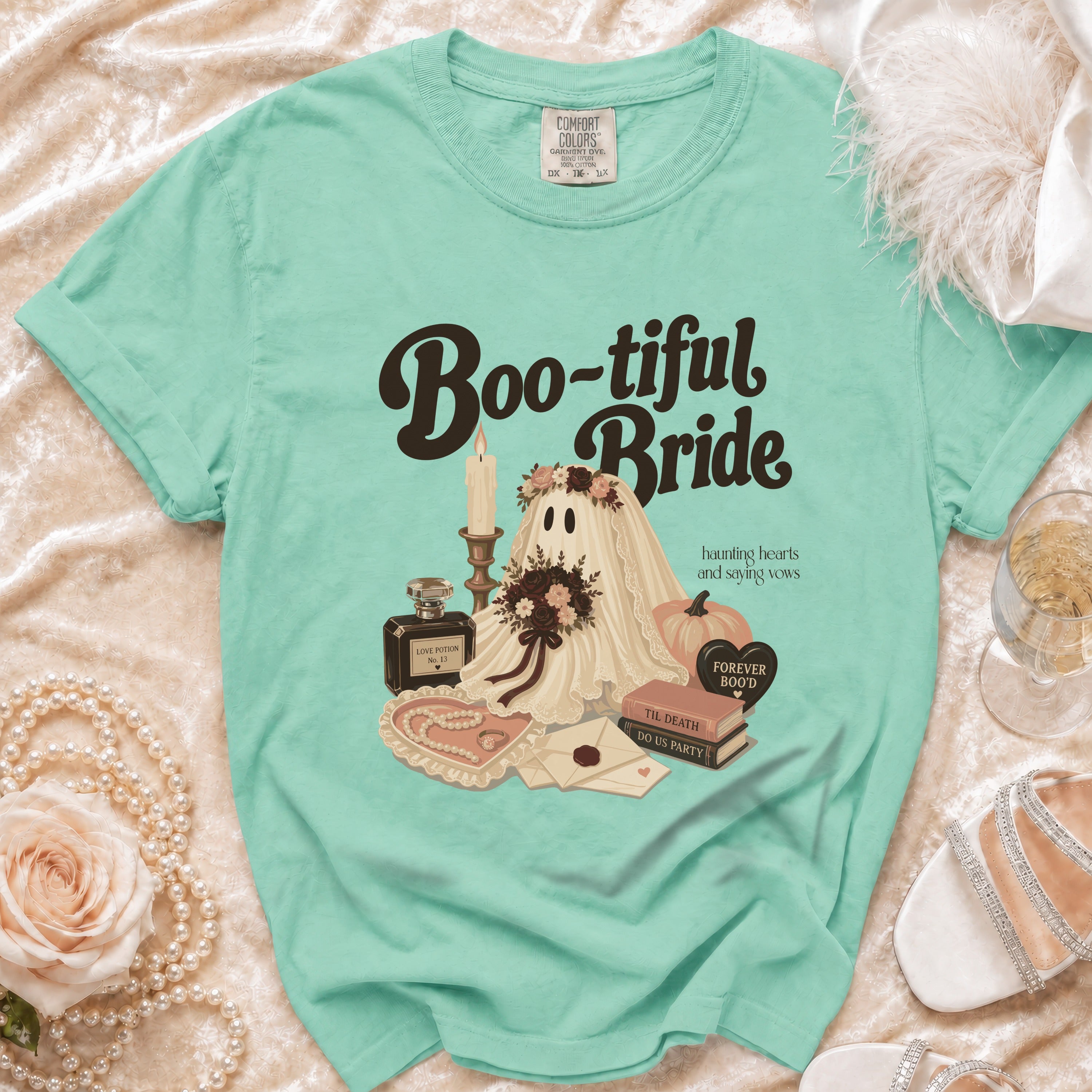 Mint t-shirt with "Boo-tiful Bride" graphic featuring a ghost, wedding items, and text.