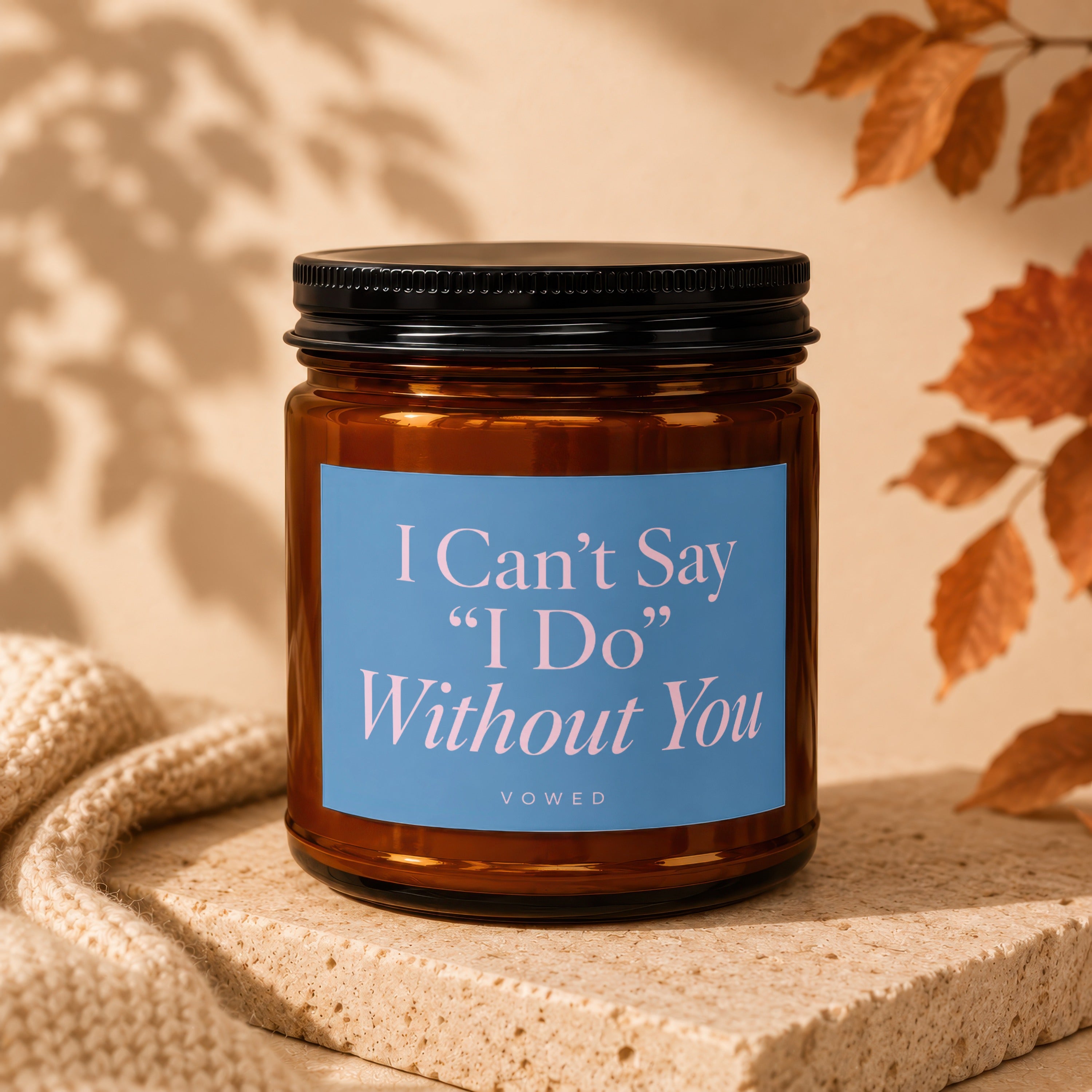 Amber candle with blue label reading "I Can't Say "I Do" Without You"