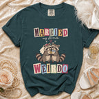 Dark teal t-shirt with "MARRIED my favorite WEIRDO" and two raccoons.