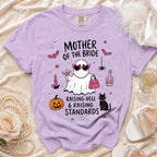 Purple t-shirt with "Mother of the Bride" text and Halloween-themed ghost design.