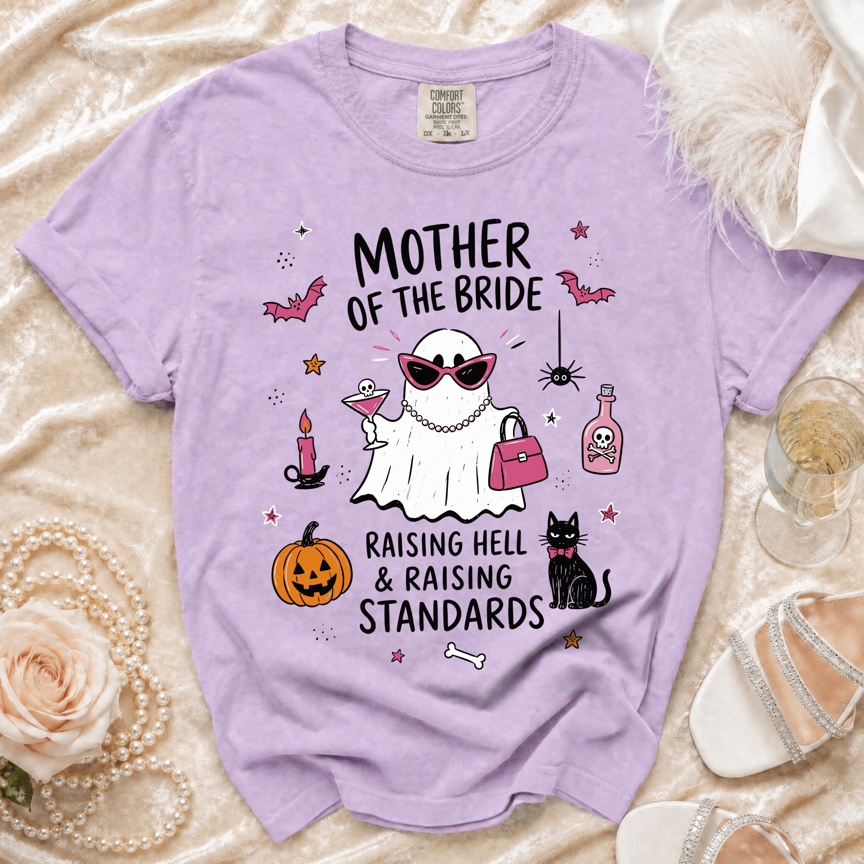 Purple t-shirt with "Mother of the Bride" text and Halloween-themed ghost design.