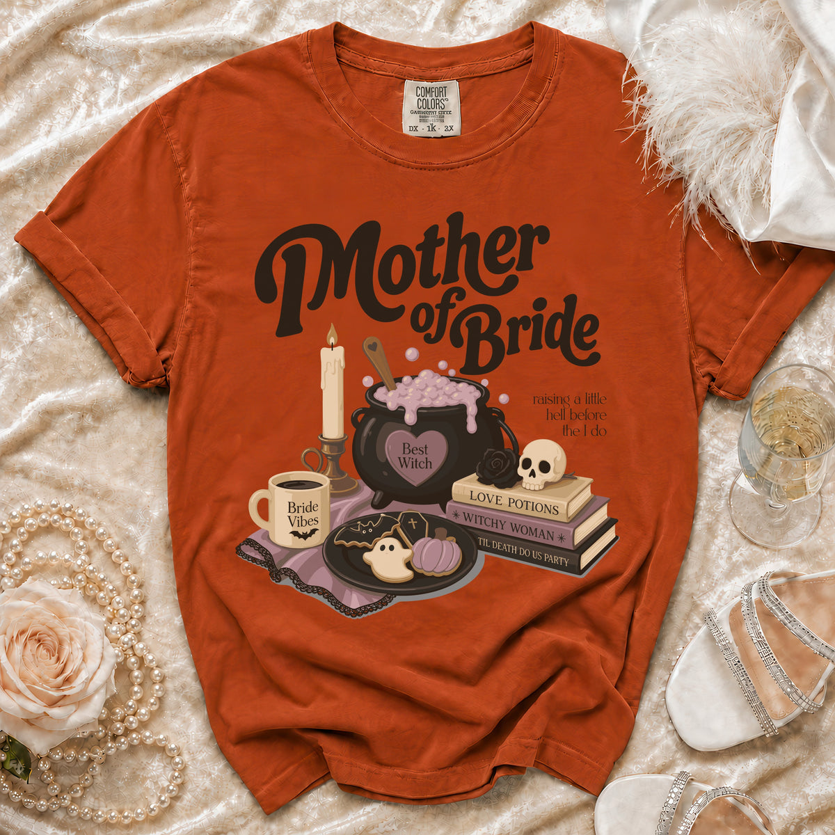 Orange t-shirt with "Mother of Bride" and Halloween-themed graphics.
