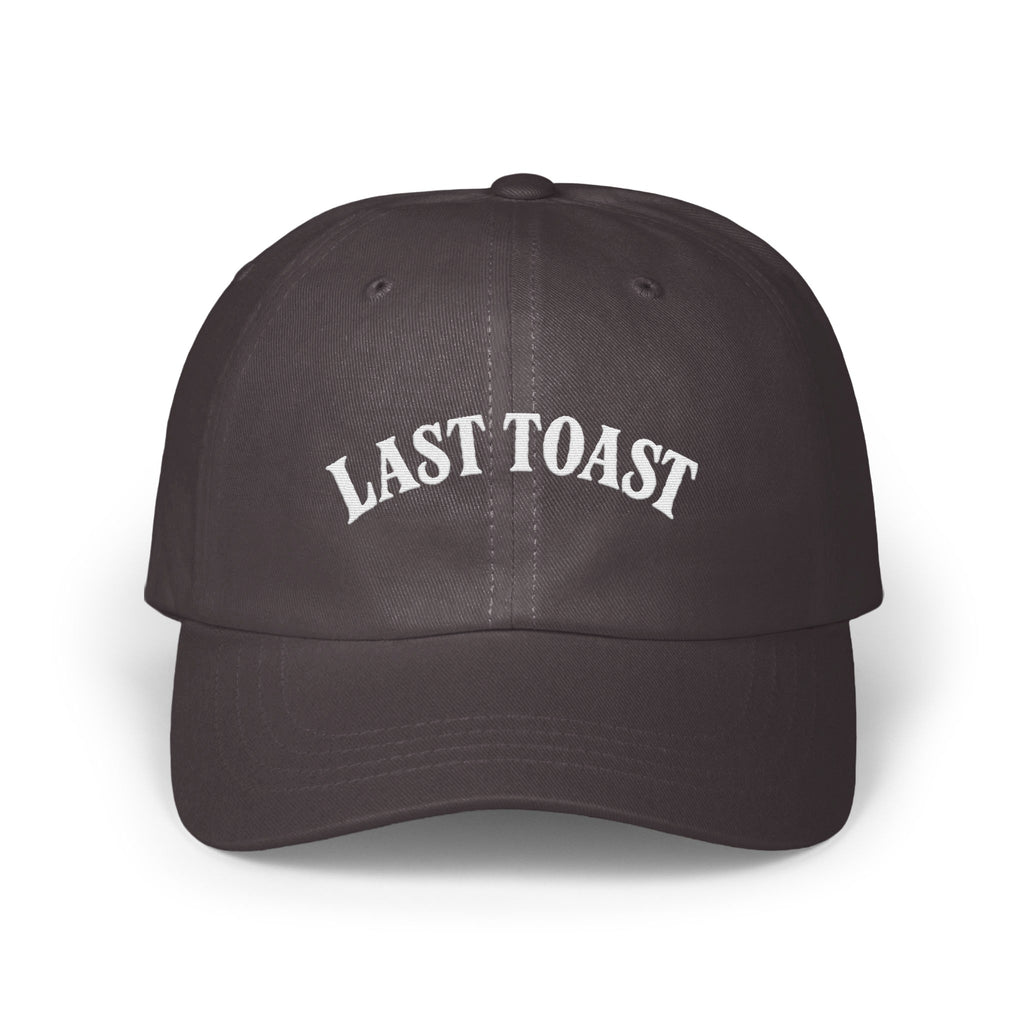 Dark gray baseball cap with "LAST TOAST" embroidered in white lettering.