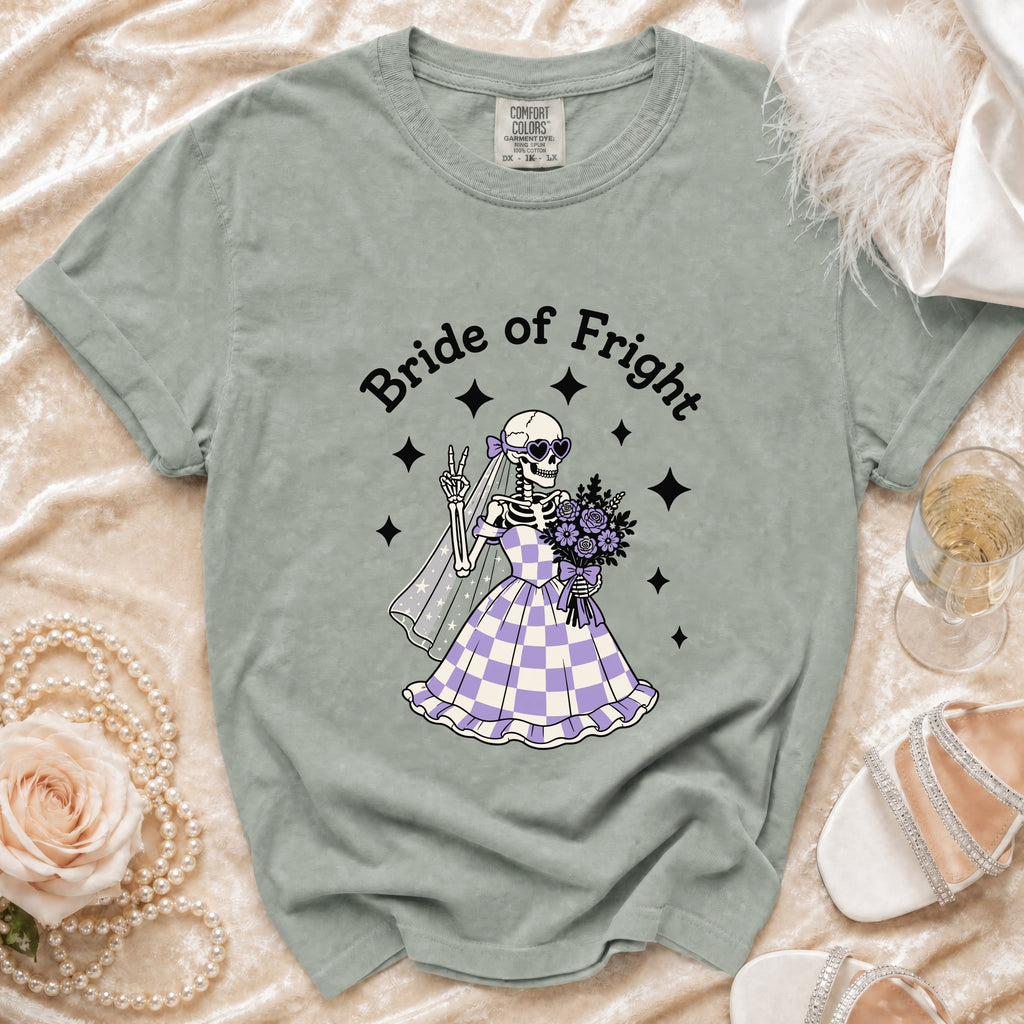 T-shirt with "Bride of Fright" text and skeleton bride graphic wearing a checkered dress.