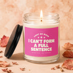 Soy wax candle with pink label reading "Light me when I can't form a full sentence."