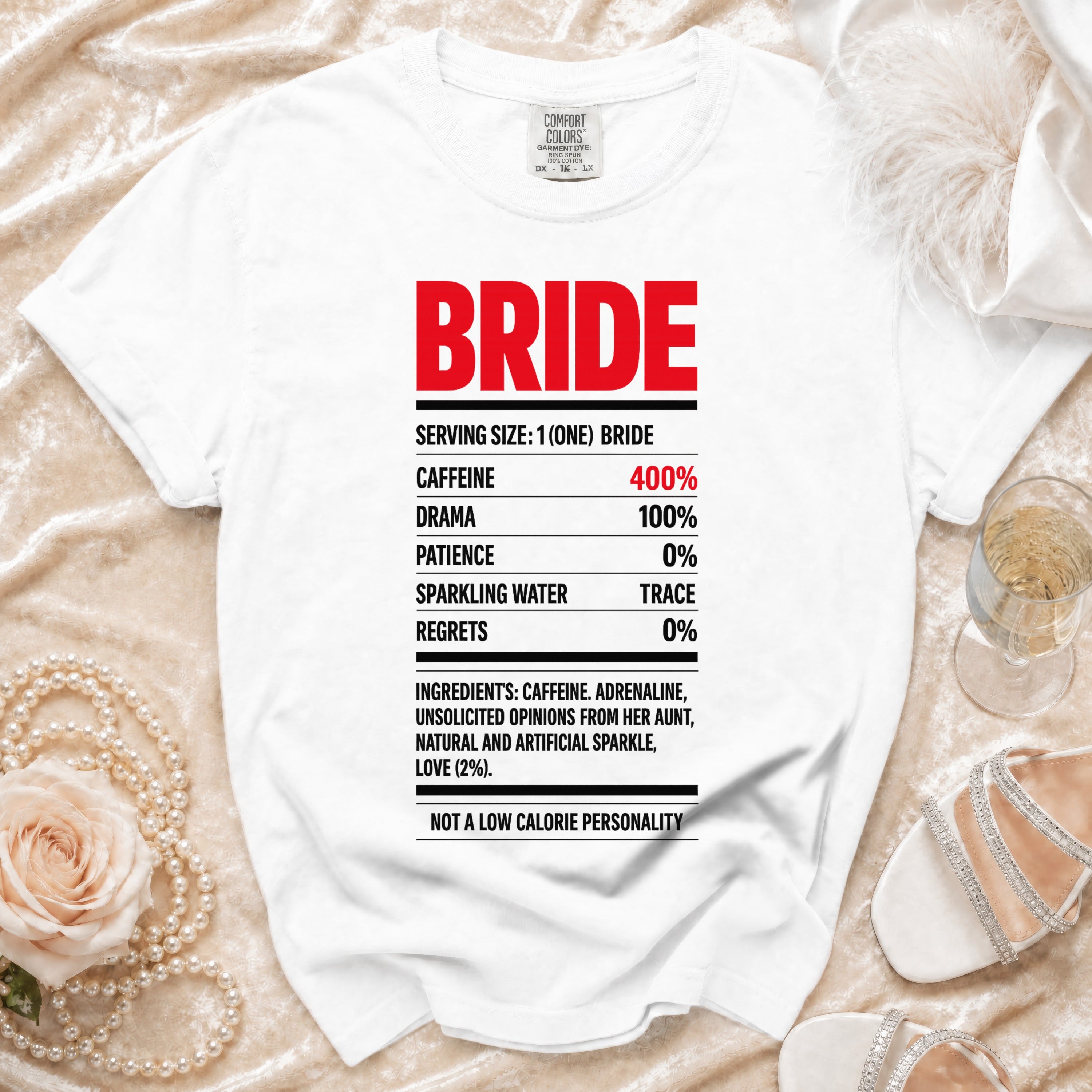 White t-shirt with "BRIDE" and a nutritional label of ingredients and percentages.