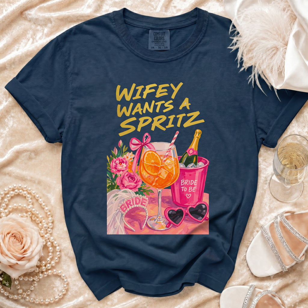 Navy t-shirt with "Wifey Wants a Spritz" graphic and bridal accessories.
