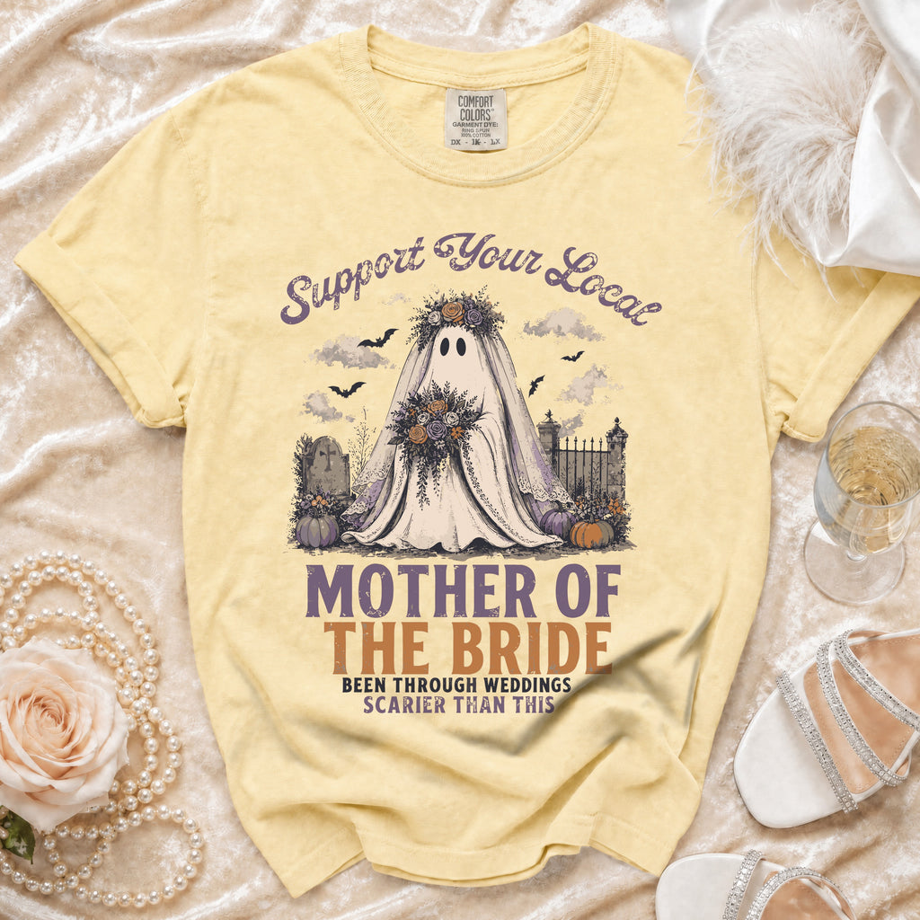 Yellow t-shirt with a ghost bride graphic and text: "Mother of the Bride Been Through Weddings Scarier Than This".