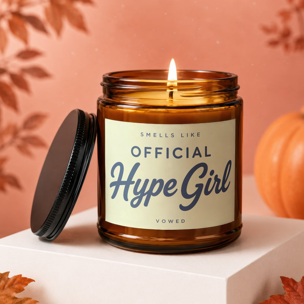 Amber jar candle with "Smells Like Official Hype Girl" text and a lit wick.