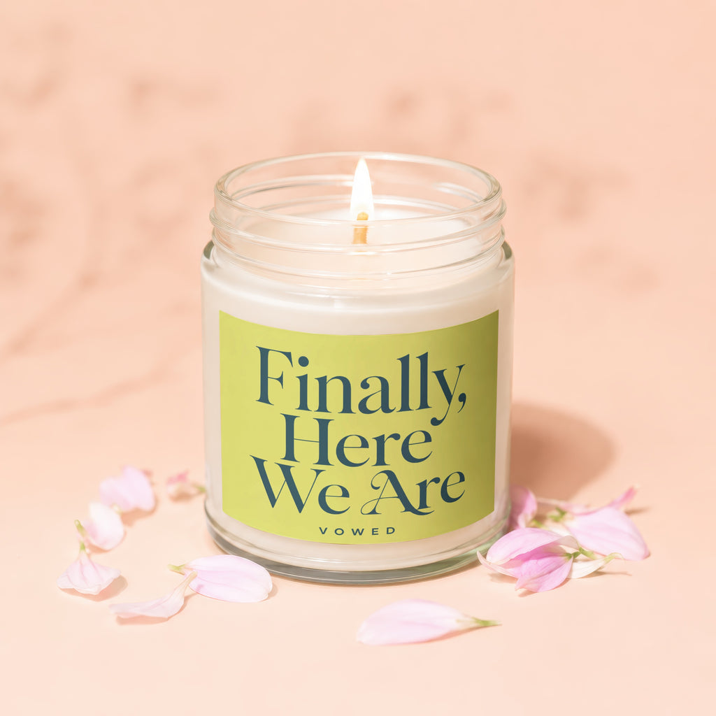 Candle with lit wick, label reads "Finally, Here We Are Vowed".