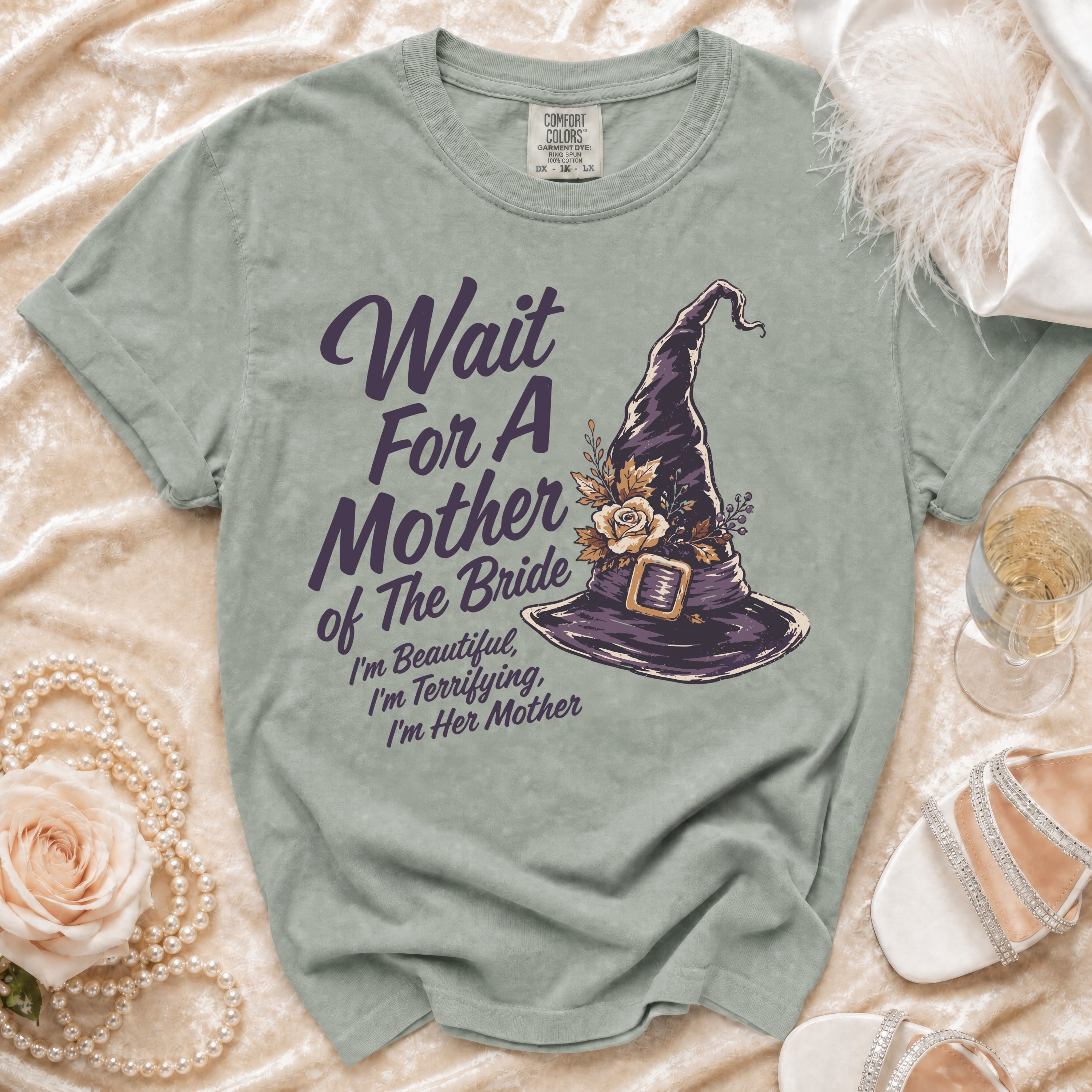 Green t-shirt with "Wait For A Mother of The Bride" and witch hat design.