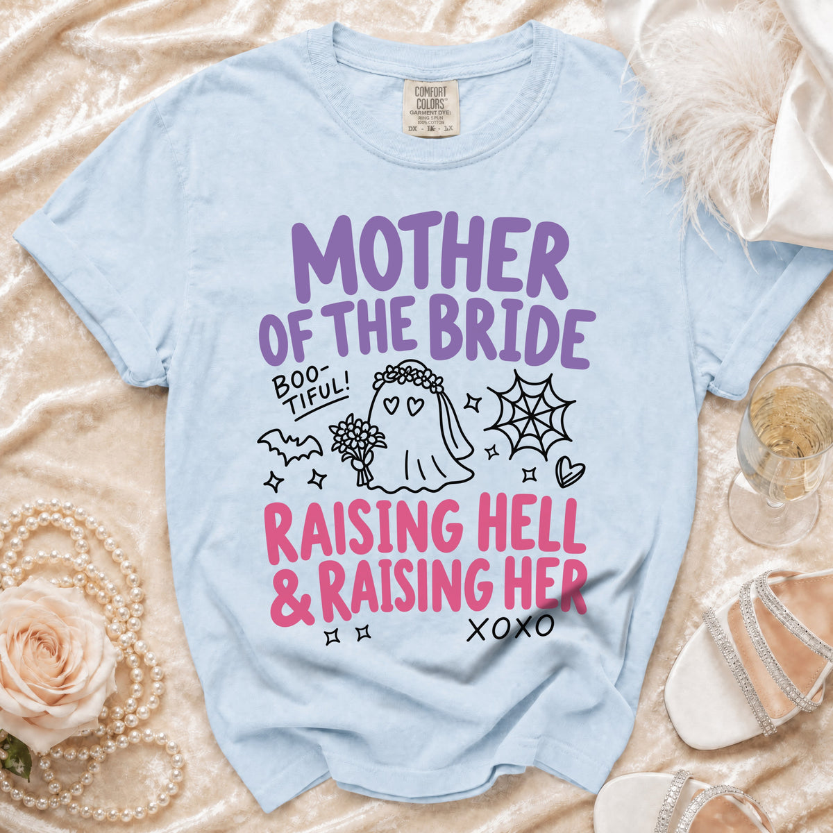 Light blue t-shirt with "Mother of the Bride Raising Hell & Raising Her" text.