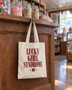 Lucky Bride Syndrome canvas tote bag on a bachelorette trip with the crew