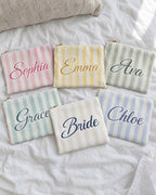 Personalised Last Toast On The Coast name pouches in mixed stripe colours with the Bride pouch