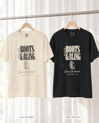 Ivory bride shirt printed in Black next to a Black crew shirt printed in ivory, Boots & Bling tees