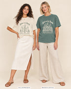 Ivory bride shirt printed in Blue Spruce next to a Blue Spruce crew shirt printed in ivory, Bride & Ladies Of The Realm tees
