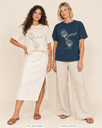 Ivory bride shirt printed in True Navy next to a True Navy crew shirt printed in ivory, Coastal Cowgirl tees