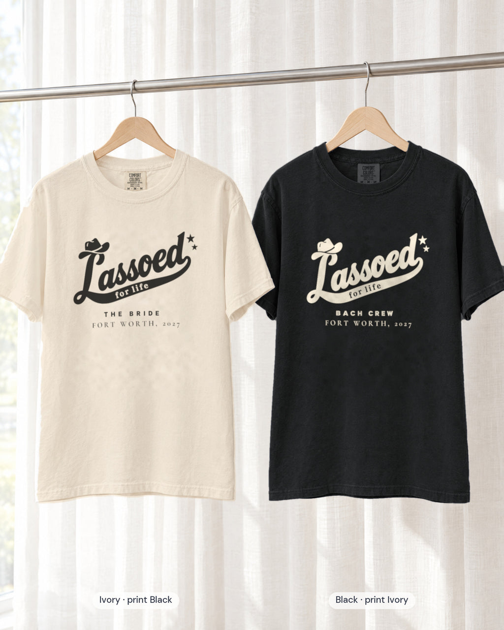 Ivory bride shirt printed in Black next to a Black crew shirt printed in ivory, Lassoed For Life tees