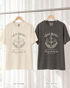 Ivory bride shirt printed in Pepper next to a Pepper crew shirt printed in ivory, Last Quest Before The Dress tees