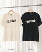 Ivory bride shirt printed in Black next to a Black crew shirt printed in ivory, Let's Get Rowdy tees