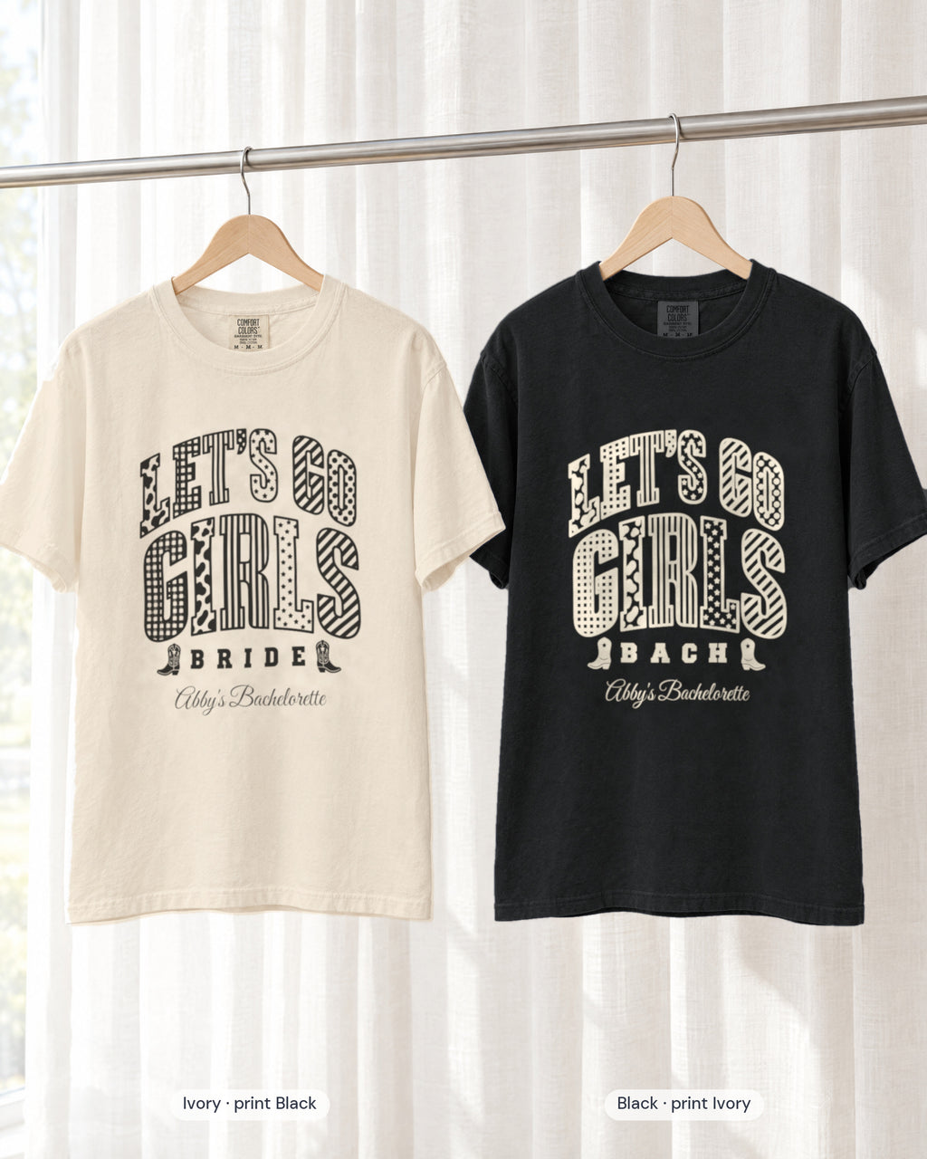 Ivory bride shirt printed in Black next to a Black crew shirt printed in ivory, Let's Go Girls tees