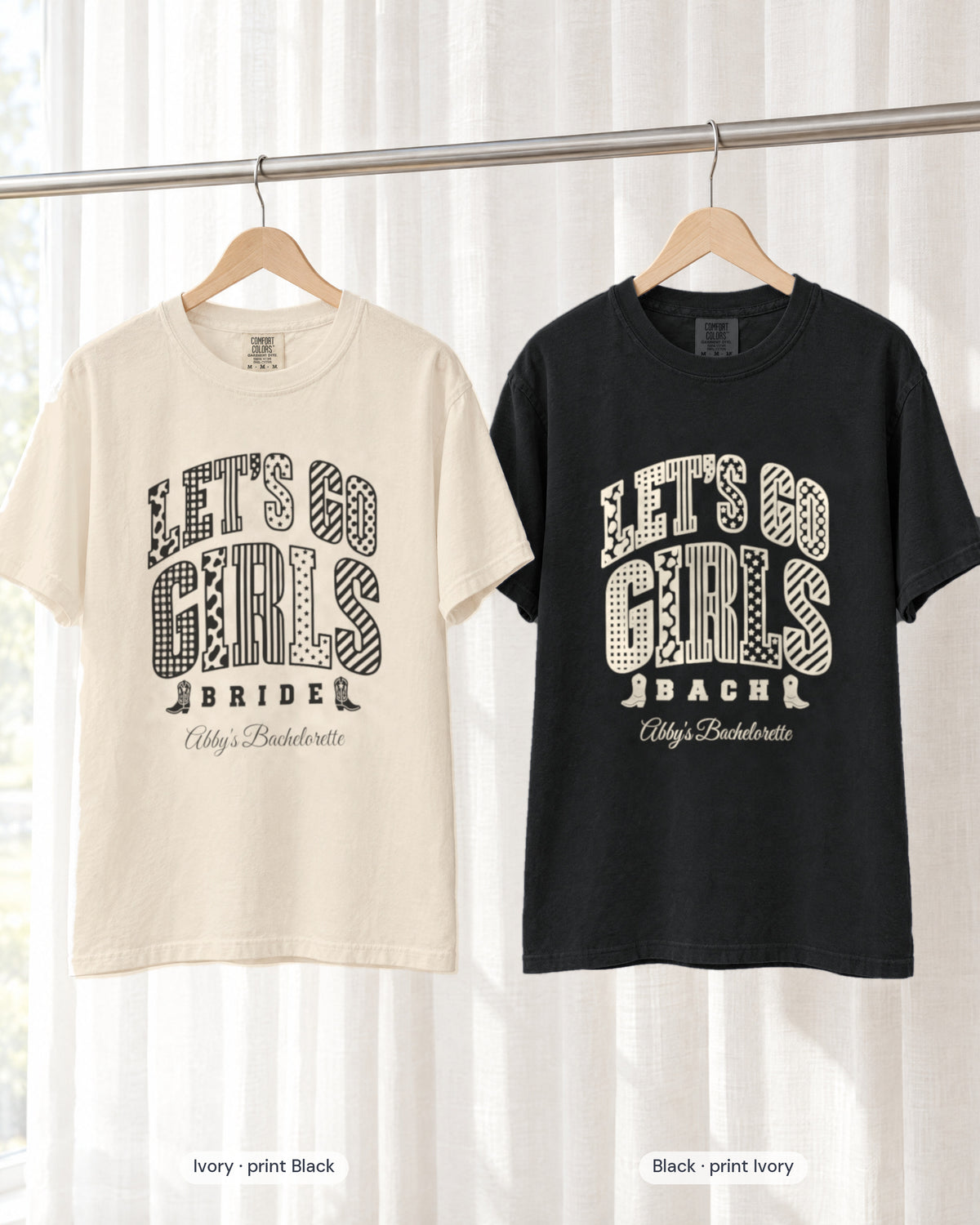 Ivory bride shirt printed in Black next to a Black crew shirt printed in ivory, Let's Go Girls tees