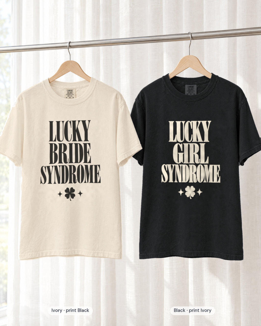 Ivory bride shirt printed in Black next to a Black crew shirt printed in ivory, Lucky Bride & Lucky Girl Syndrome tees