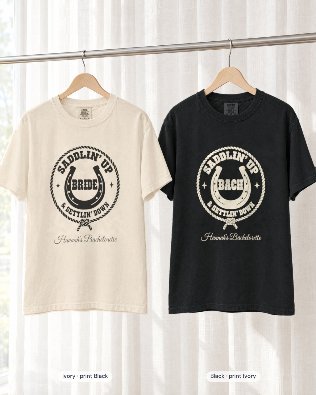 Ivory bride shirt printed in Black next to a Black crew shirt printed in ivory, Saddlin' Up & Settlin' Down tees
