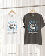 White bride shirt printed in Pepper next to a Pepper crew shirt printed in white, Snow In Love tees