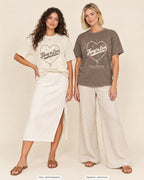 Ivory bride shirt printed in Espresso next to a Espresso crew shirt printed in ivory, Tipsy In Love tees