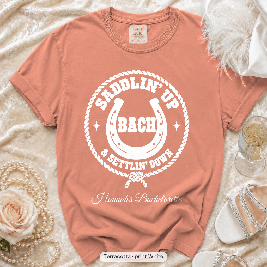 Terracotta Saddlin' Up & Settlin' Down bachelorette crew t-shirt, print in white