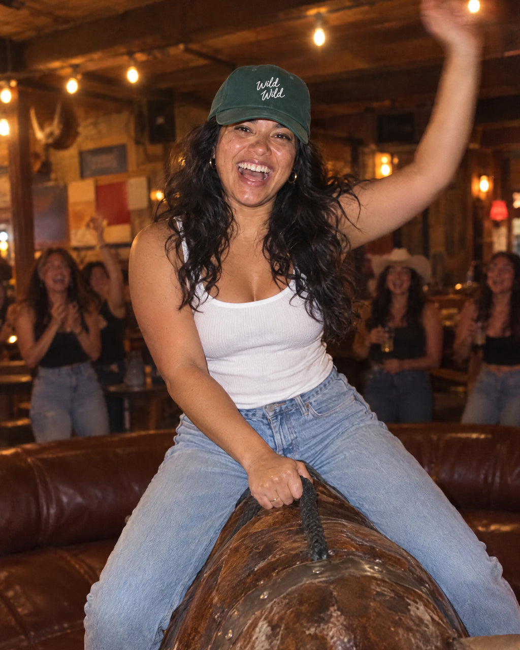 Wild Wild Wife embroidered dad caps on a bachelorette trip with the crew